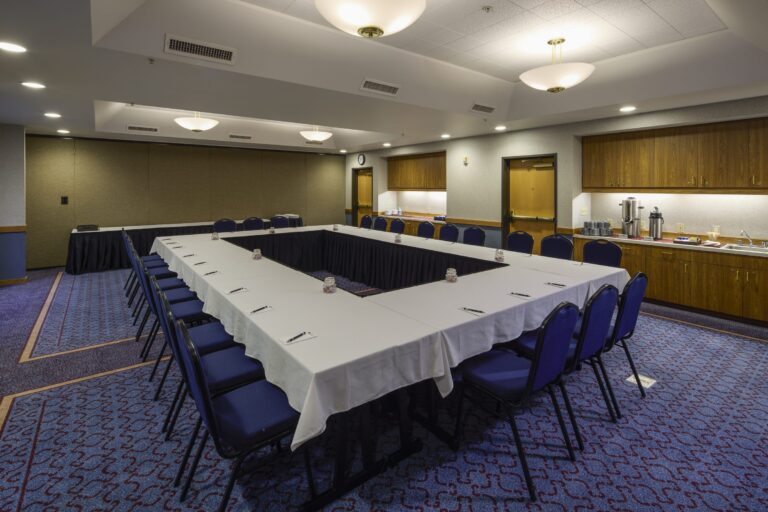 The Courtyard Room in a hollow-square layout with catering counter