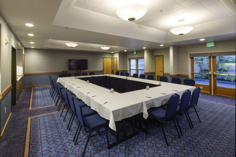 The Courtyard Room set up in a U-shape for a meeting